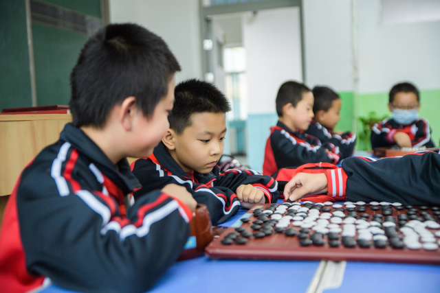 永靖县川北小学课后服务社团活动照片棋乐融融社团 (1).jpg